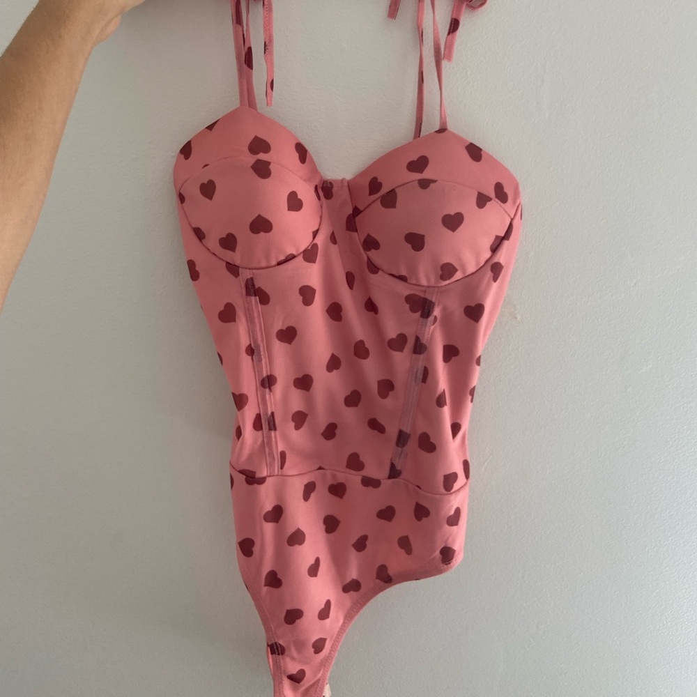 Heart bodysuit.  Super formfitting and cute
